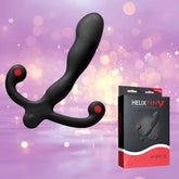 Aneros Helix Syn V Vibrating Prostate Massager, in sleek black with red accents, floats above a blurred pink and purple bokeh background. Its branded packaging is displayed beside it, highlighting the intense vibrations it offers.